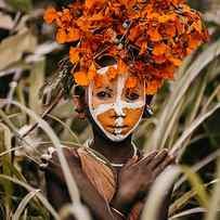 Suri Boy And Flowers by Vedran Vidak