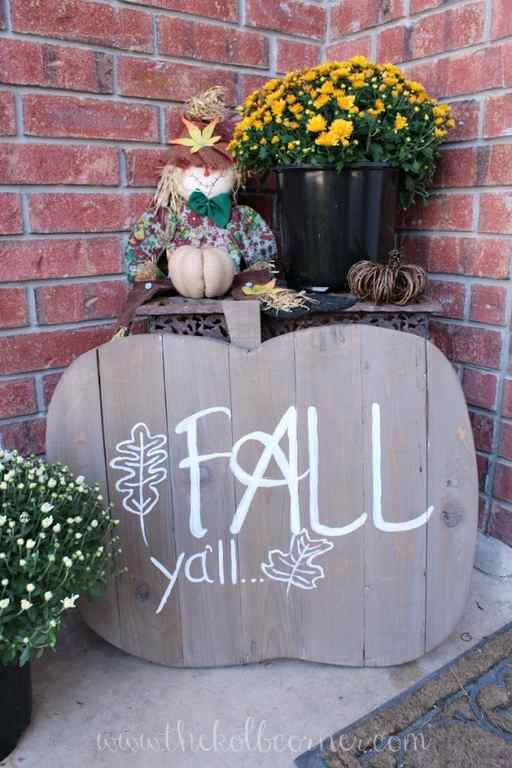 Finished wooden pumpkin sign that says 