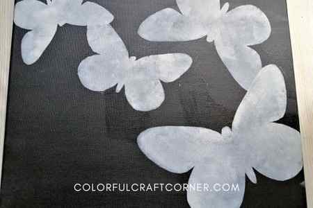 stenciled butterfly on canvas