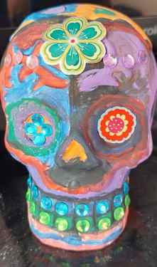 Hand painted/decorated ceramic skull ornament by Kaya Nikita