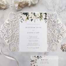 whispers of white-elegant ivory and white flowers greenery laser cut wedding invites