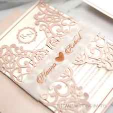 Elegant modern chic blush wedding invitations with monogram