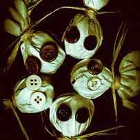 Five Halloween dolls with button eyes by Jorgo Photography