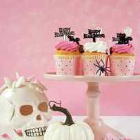 On trend pink Halloween party table with cupcakes by Milleflore Images